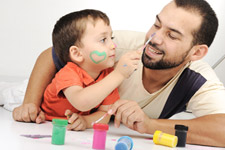 bigstock-Father-and-kid-playing-with-pa-40414408
