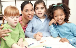 teacher with students coloring